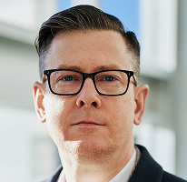 Alexander Hughes, CEO di sebuah perusahaan trading kripto, potret